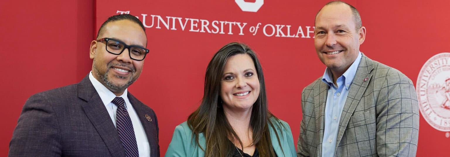 Mandi Atwell (center) receives her Outstanding Senior award.