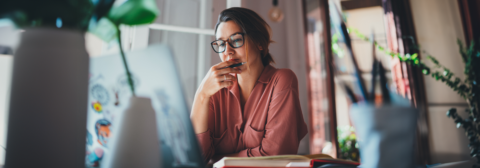 Woman looking at a computer.