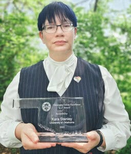 Kara Stanley oustide with her award.