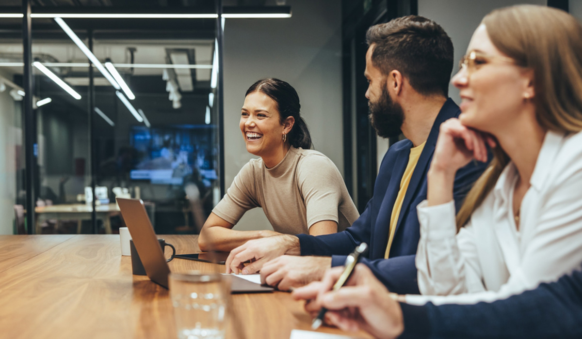 diverse group of business professional around a table