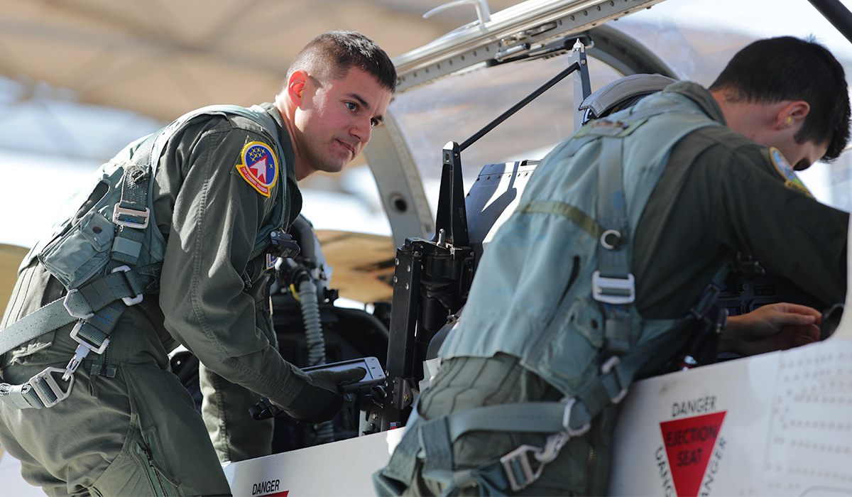 pilots checking plane