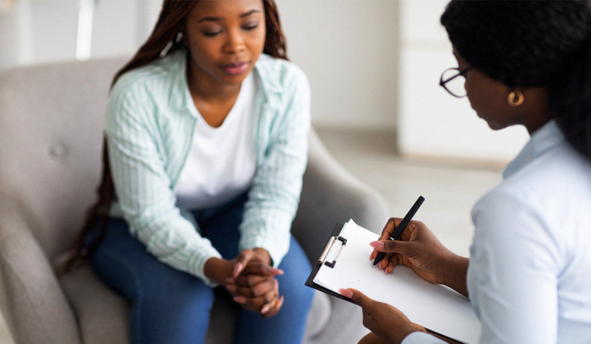 social worker meeting with a client