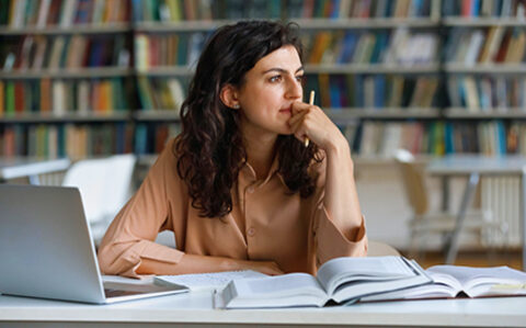 student at her desk