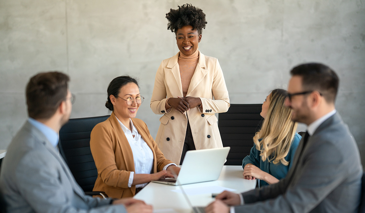 business executive presenting at a meeting