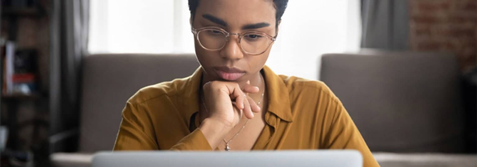 Adult student looking at a computer