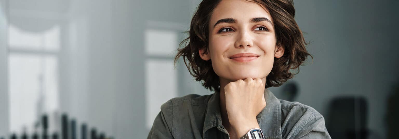 woman smiling after learning her credits will transfer to OU