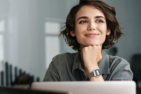 Woman smiling after learning her credits will transfer