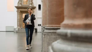 Arts manager walking through a gallery