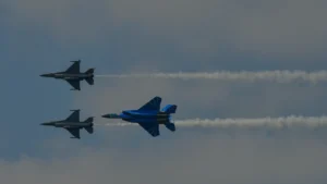 Three military jets flying in formation