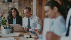 accountants working at conference table