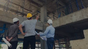 three constructions managers on a site