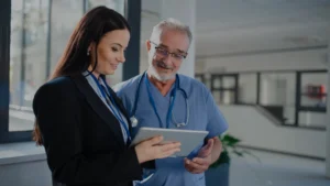 medical professional discussing patient's chart